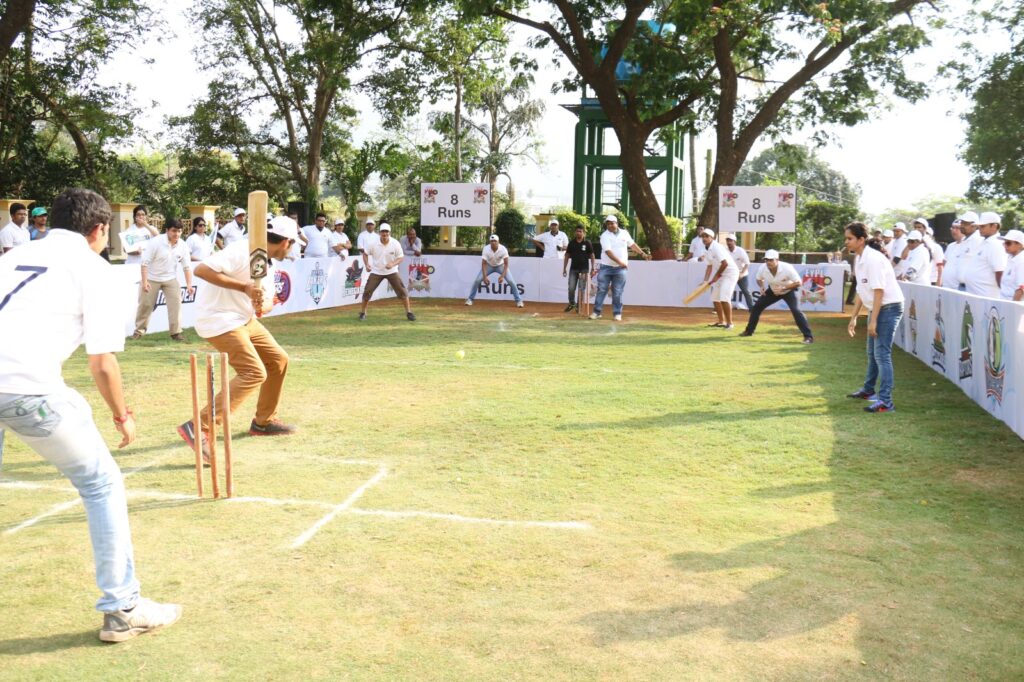 Corporate games, box cricket, auction, fun, corporate team building